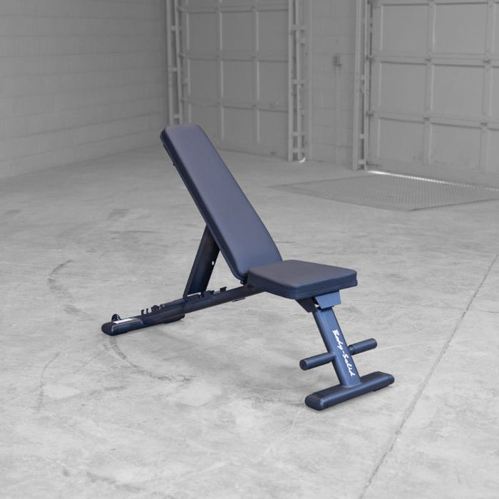 Body-Solid GFID225B Folding FID Bench - Black Frame - in Warehouse Setting