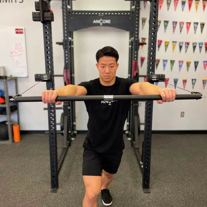 Ancore Straight Bar standing press exercise