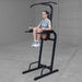 Best Fitness Vertical Knee Raise Dip Pull Up Station BFVK10 - front view doing knee raises