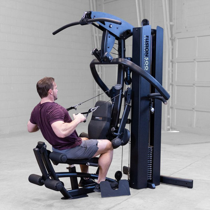 Body-Solid F500/F500B Fusion 500 Modular Single Stack Gym leg seated cable row male