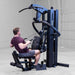 Body-Solid F500/F500B Fusion 500 Modular Single Stack Gym leg seated cable row male