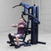 Body-Solid F500/F500B Fusion 500 Modular Single Stack Gym male performing seated row