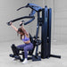 Body-Solid F500/F500B Fusion 500 Modular Single Stack Gym shoulder press exercise