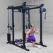 Body-Solid Functional Trainer Attachment SPRFTS female half kneeling lat pulldown