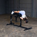 Body-Solid Pro Clubline Glute Ham Developer SGH500B demo woman back extension