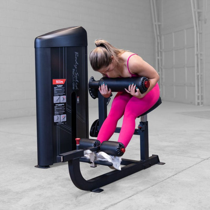 Body-Solid Pro Clubline Series II Ab and Back Machine S2ABBX Black Frame demo woman forward crunch