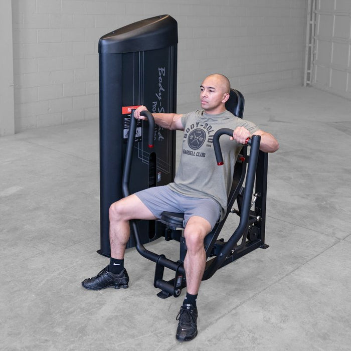 Body-Solid S2CPX PCL Series II Chest Press Machine with Black Frame with Model Using Machine in Warehouse