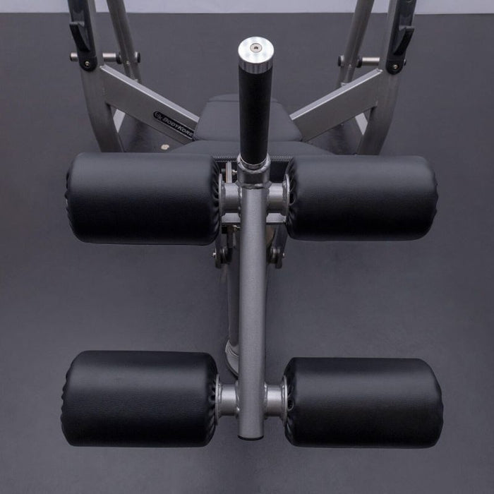 BodyKore Elite Olympic Decline Press CF2153 leg holder rollers front view
