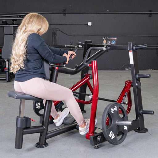 Muscle D Power Leverage V2 Dual Hinge Seated Row female athlete angled