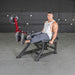 Muscle D Power Leverage V2 Leg Extension Male User Extended Position