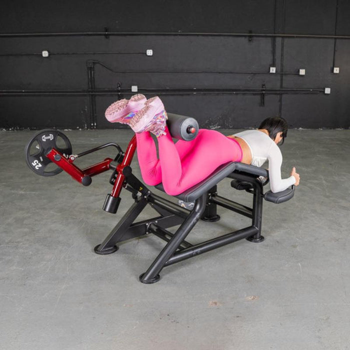 Muscle D Power Leverage V2 Prone Leg Curl Woman Using Machine