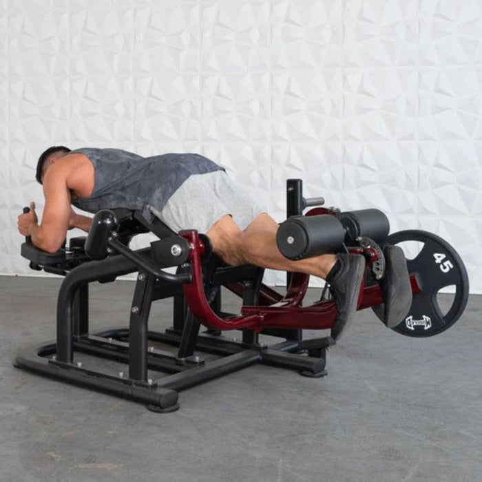 Muscle D Pro Strength Prone Leg Curl male demo extended position