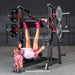 Muscle D Power Leverage V2 Vertical Leg Press PL-PV2-VLP Female Demo Leg Extension