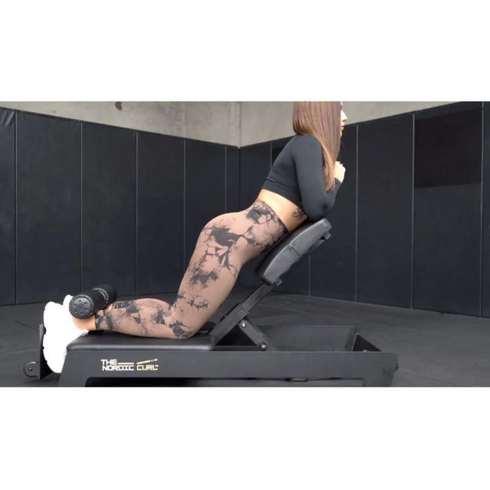 The Abs Company Nordic Curl assisted setup position