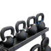TKO 5-50lb Vinyl Kettlebell Set with 3-Tier Rack closeup top shelf kettlebells
