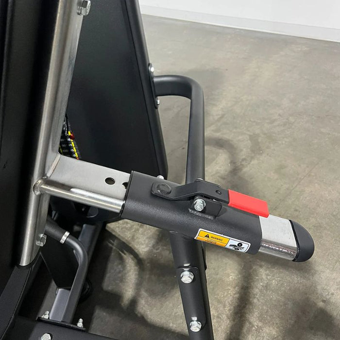 TKO Strength Achieve Leg Extension Leg Curl pad controls closeup