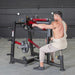 Muscle D Power Leverage V2 Lateral Raise man lowering arms