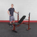 Best Fitness BFOB10 Folding Olympic Bench with Leg Developer Standing