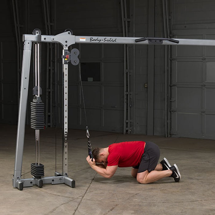 Body-Solid GDCC250 Deluxe Cable Crossover Arm Pulling Downward