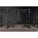 Body-Solid SPRACB Power Rack Connecting Bar Front View With Punching Bag