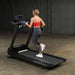 Body-Solid T150 Commercial Treadmill Back Side View Female Model