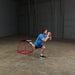 Body-Solid Tools BSTPBS Plyo Box Sets Ground Stretching One Leg Over Side View