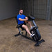 Endurance by Body-Solid Recumbent Bike B4RB Front Side View Male Model