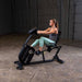 Endurance by Body-Solid Recumbent Bike B4RB Side View Facing Left With Female Model