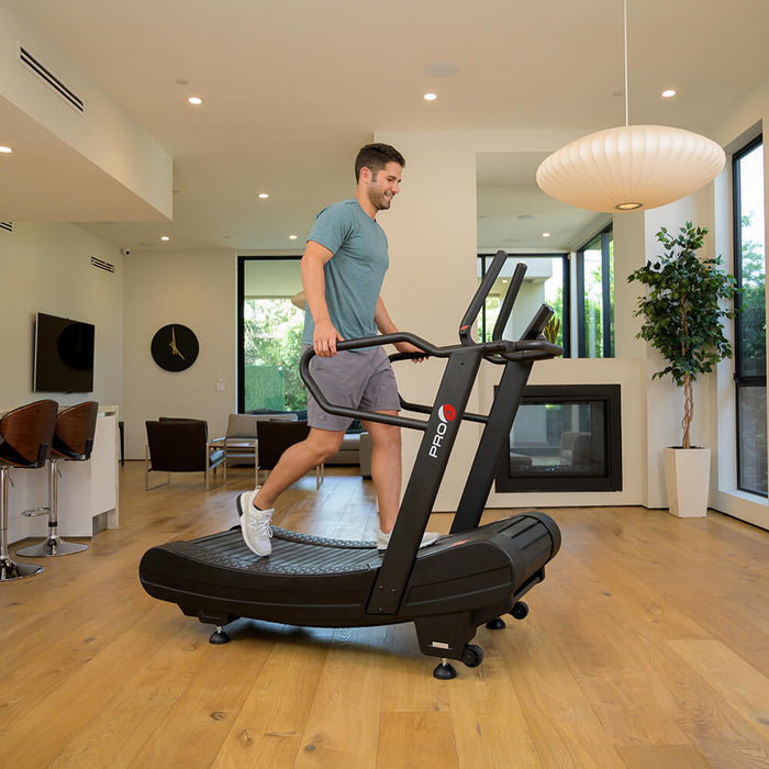 Pro 6 Arcadia Air Runner Treadmill Male Model Side View Holding