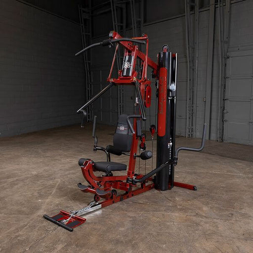 Body-Solid G6BR Home Gym System with Red Frame in Warehouse Setting